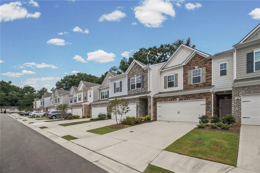 Front exterior of a new home in , Powder Springs, GA, highlighting curb appeal (Image 21).