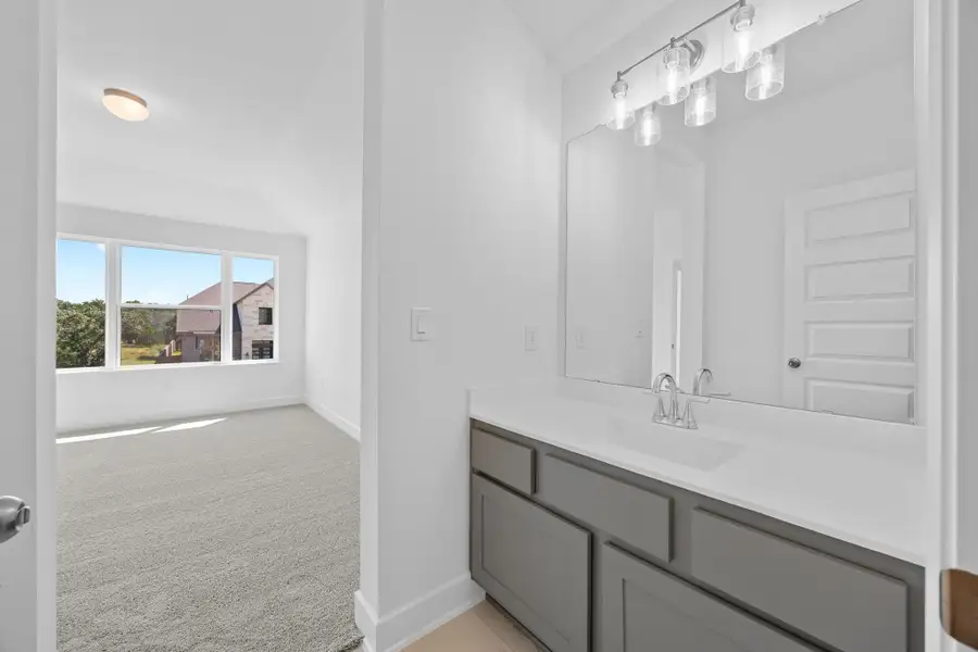 Furnished interior view inside a new home in Parmer Ranch - 60', Georgetown (Image 8).