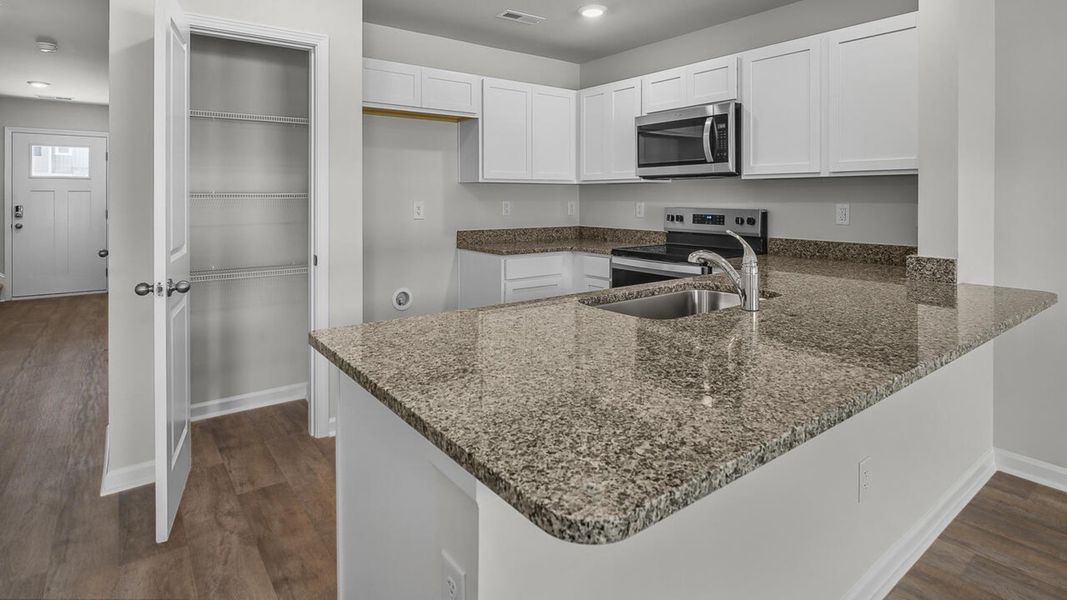 Furnished interior view inside a new home in Townes at Seabrooke, Leland (Image 9).