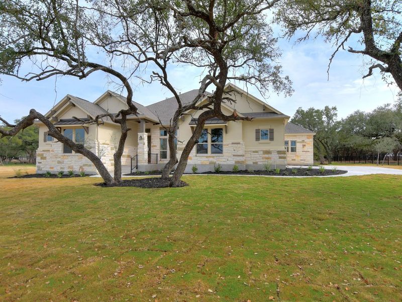 Representative exterior photo of a completed home built from the Siena II by Giddens Homes in Clearwater Ranch, Liberty Hill, TX (Image 35).