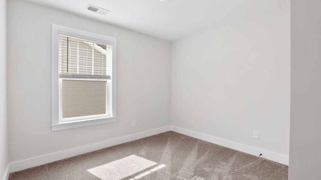 Representative unfurnished interior of a home built from the Bakersfield by D.R. Horton in Edgewood Estates, Greenville (Image 28).