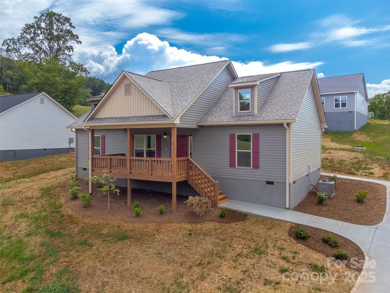 Front exterior of a new home in , Franklin, NC, highlighting curb appeal (Image 20).