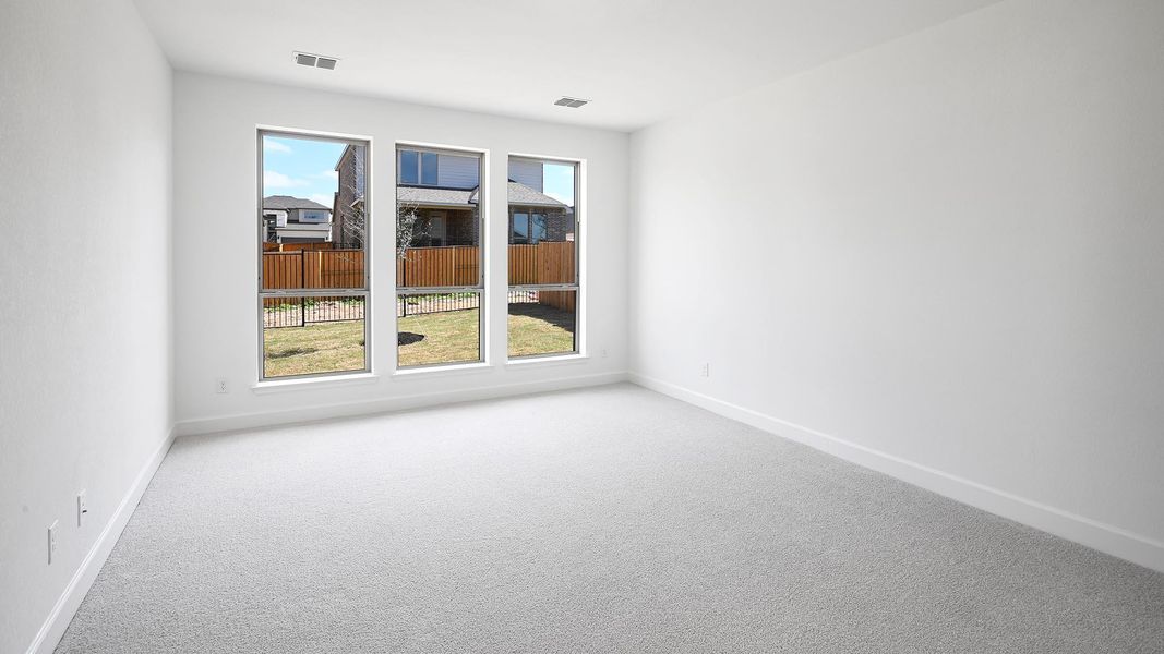 Spacious, unfurnished interior of a new home in 6 Creeks, Kyle (Image 22).