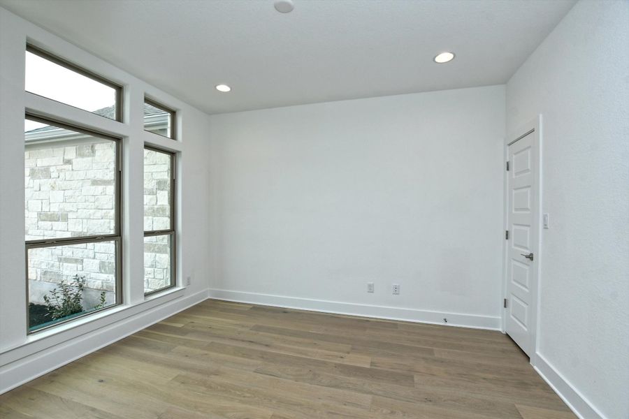 Representative unfurnished interior of a home built from the Madera II by Giddens Homes in Scofield Farms Estates, Georgetown (Image 436).