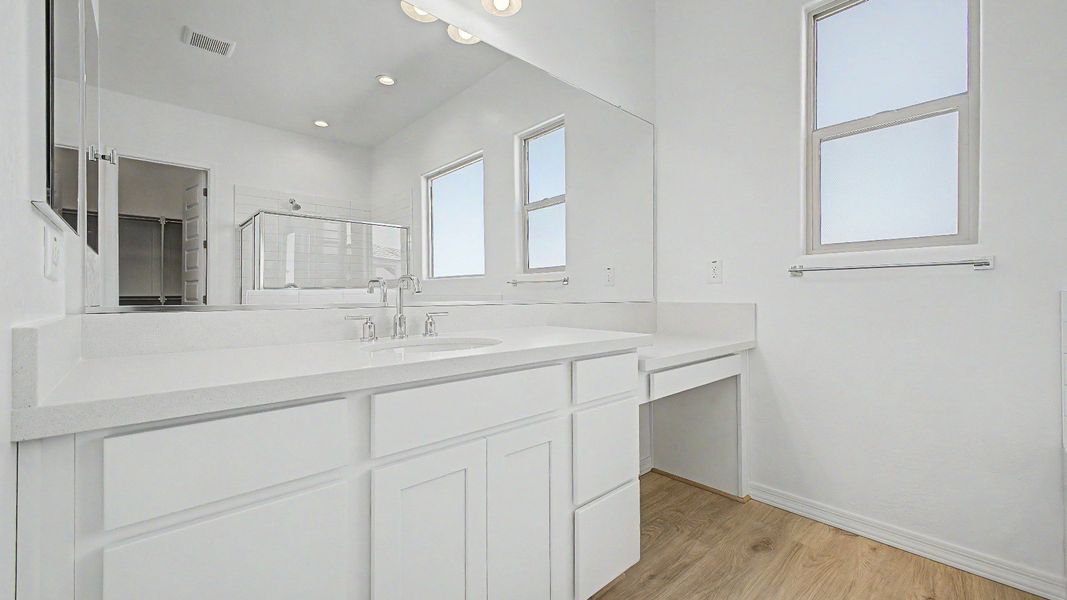 Furnished interior view inside a new home in Windrose, Waddell (Image 22).