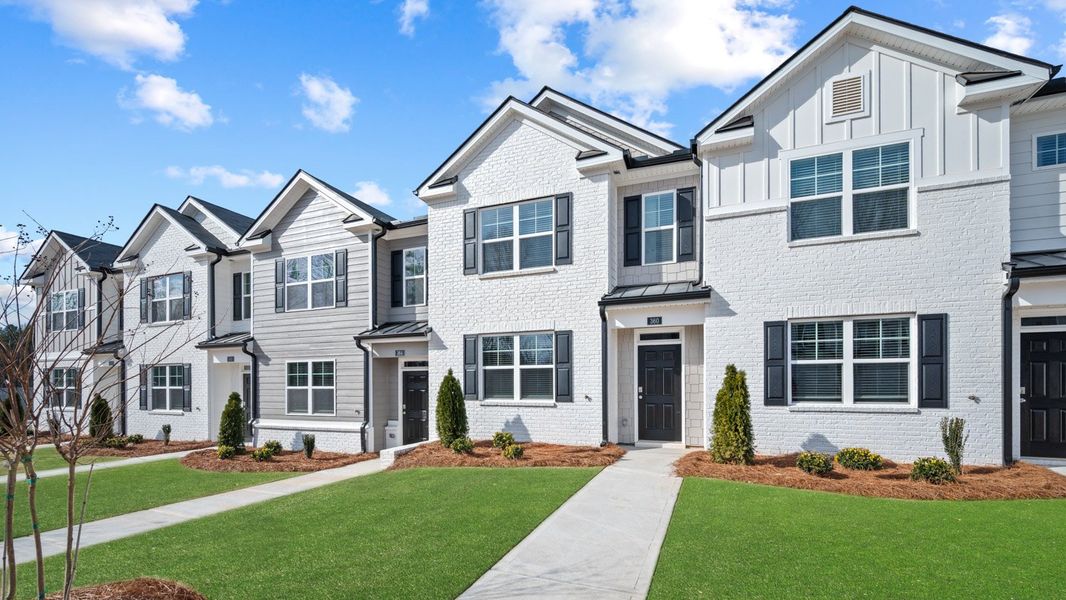 Front exterior of a new home in Echo Glen, Stockbridge, GA, highlighting curb appeal (Image 2).