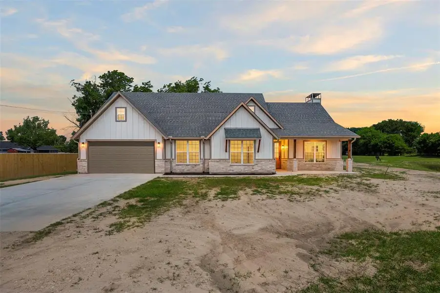Front exterior of a new home in , Kaufman, TX, highlighting curb appeal (Image 1). Front exterior of a new home in , Kaufman, TX, highlighting curb appeal (Image 1).