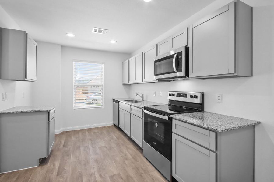Furnished interior in a model home at Gemini in Splendora (Image 18).