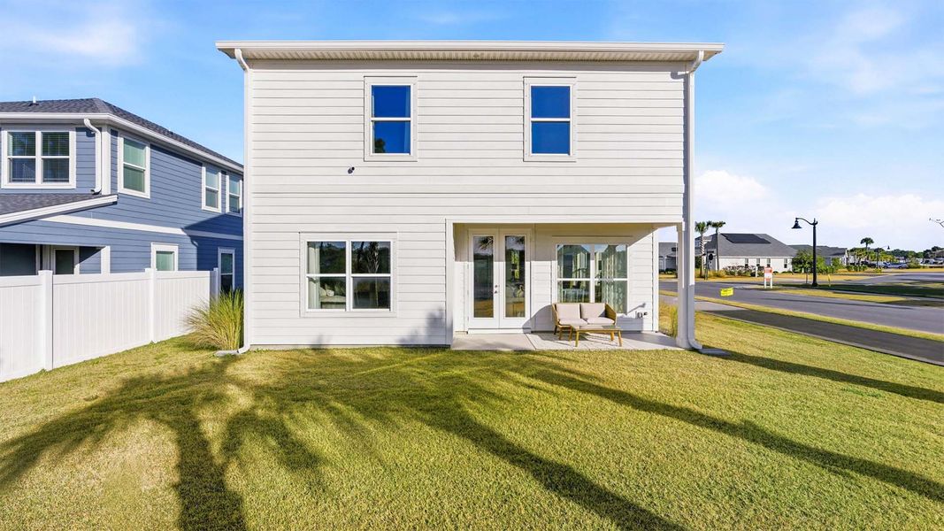 Exterior details and patio area of a home in Breakfast Point East Phase I, Panama City Beach (Image 23).