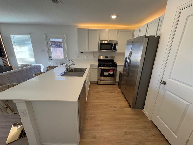 Beautiful and clean kitchen for the chef of the house.