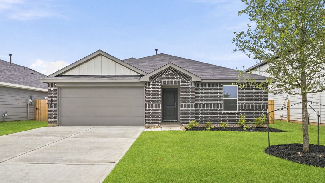 Front exterior of a new home in Silverthorne, Conroe, TX, highlighting curb appeal (Image 1). Front exterior of a new home in Silverthorne, Conroe, TX, highlighting curb appeal (Image 1).
