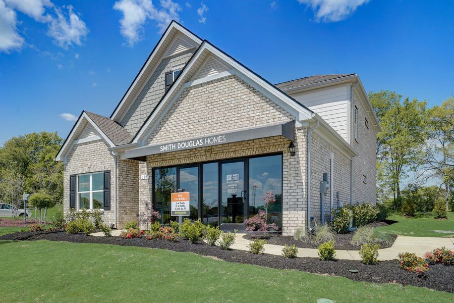 Front exterior of a new home in Winston Place, Gallatin, TN, highlighting curb appeal (Image 2).