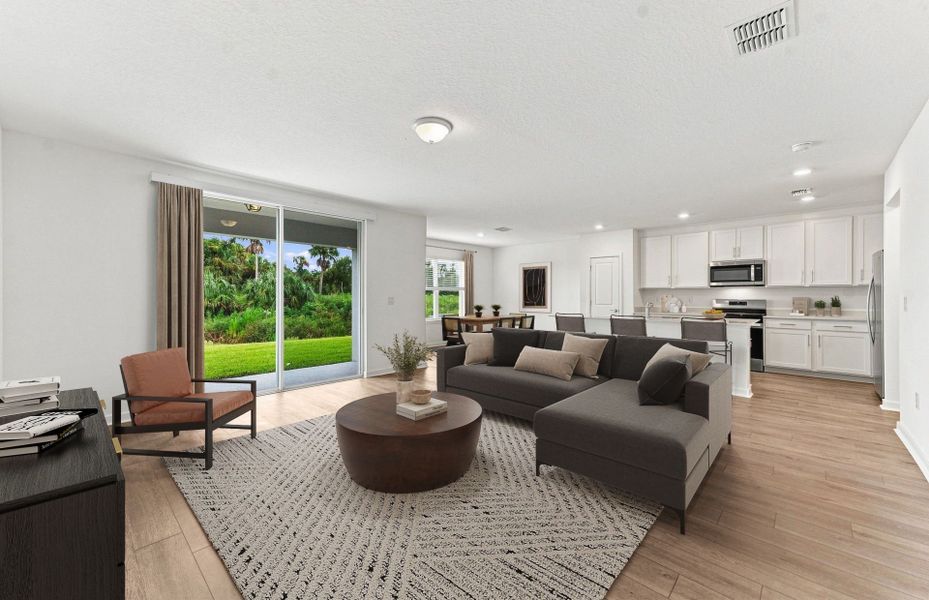 Furnished interior view inside a new home in Oakfield Trails, Parrish (Image 7).
