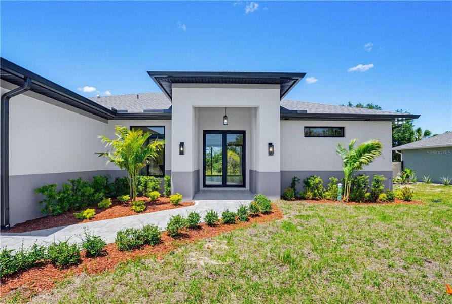 Exterior details and patio area of a home in , North Port (Image 30).