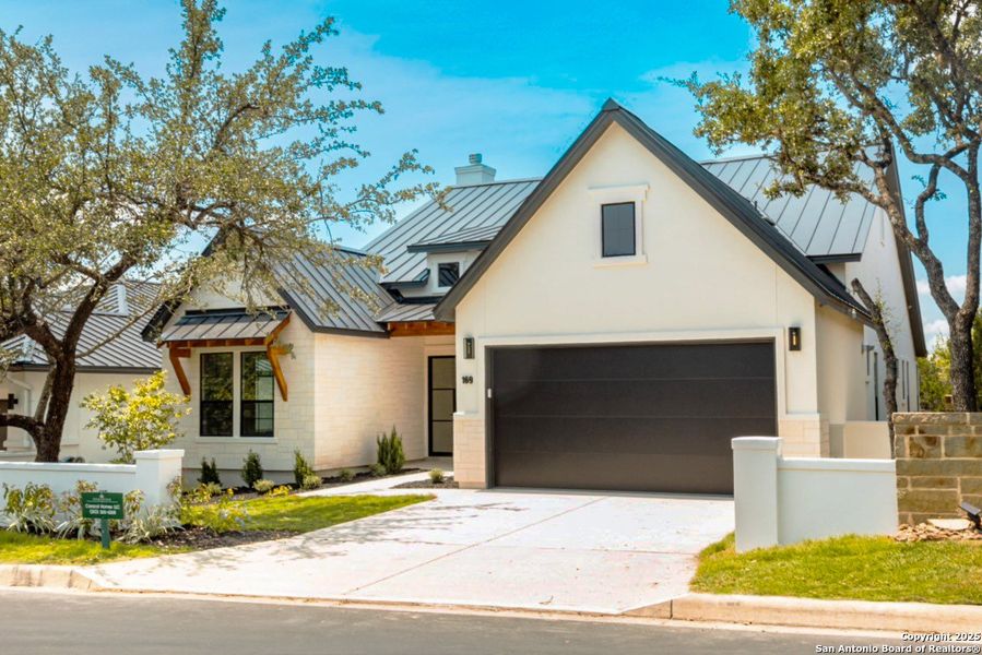 Front exterior of a new home in , San Antonio, TX, highlighting curb appeal (Image 1).