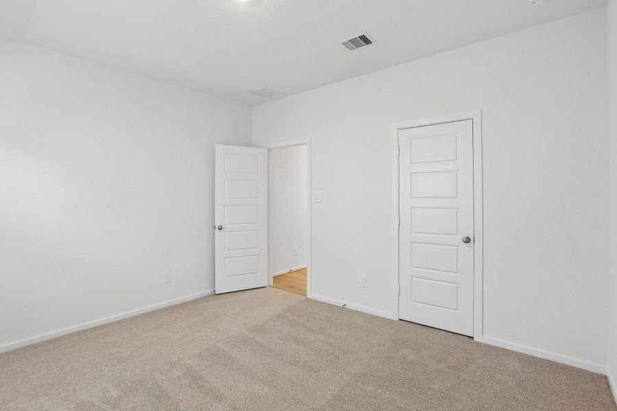 Spacious, unfurnished interior of a new home in Riviera Pines - Classic Series, Huffman (Image 31).