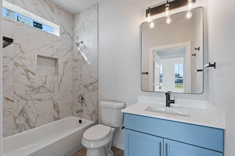 Furnished interior view inside a new home in , Conroe (Image 14).