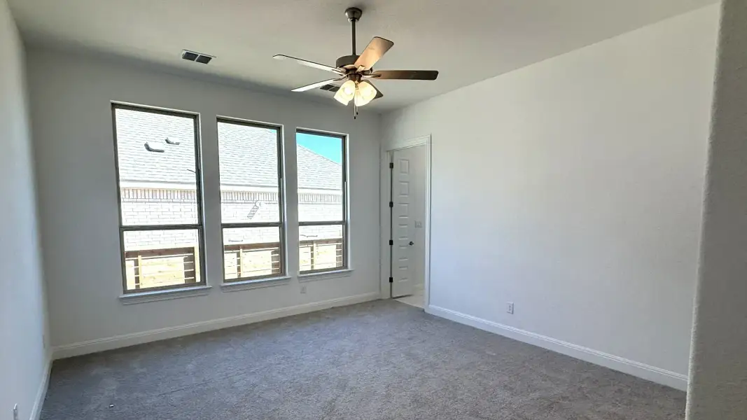 Furnished interior view inside a new home in Flora, Hutto (Image 7).