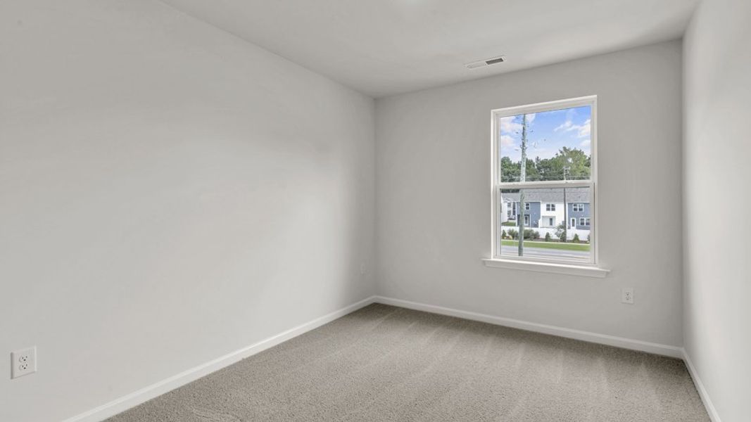 Spacious, unfurnished interior of a new home in The Townes at Wilson's Ridge, Smithfield (Image 25).
