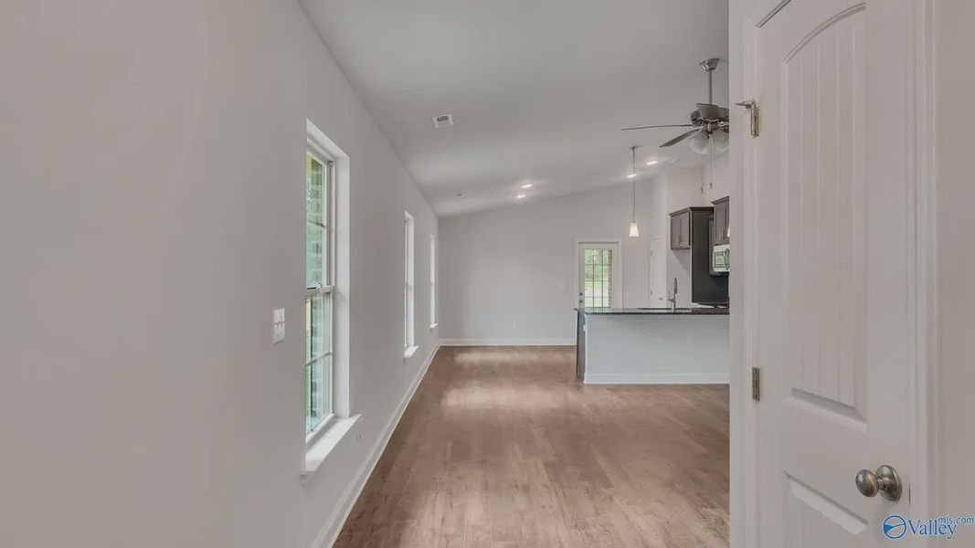 Representative unfurnished interior of a home built from the 1434 by Adams Homes in The Grove at Ballard Park, Jacksonville (Image 9).