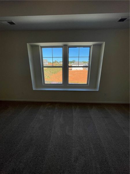 Spacious, unfurnished interior of a new home in Springwood Grove, Central (Image 26).