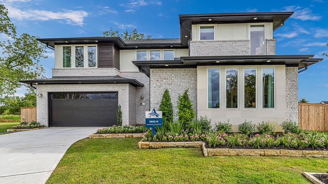 Representative exterior photo of a completed home built from the Valor by Taylor Morrison in Avalon at Cypress 60s, Cypress, TX (Image 2). Representative exterior photo of a completed home built from the Valor by Taylor Morrison in Avalon at Cypress 60s, Cypress, TX (Image 2).