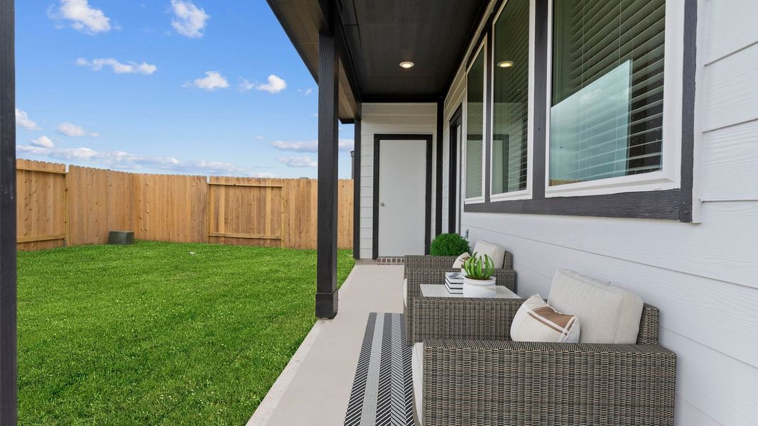 Exterior details and patio area of a home in Lexington Village, Missouri City (Image 3).