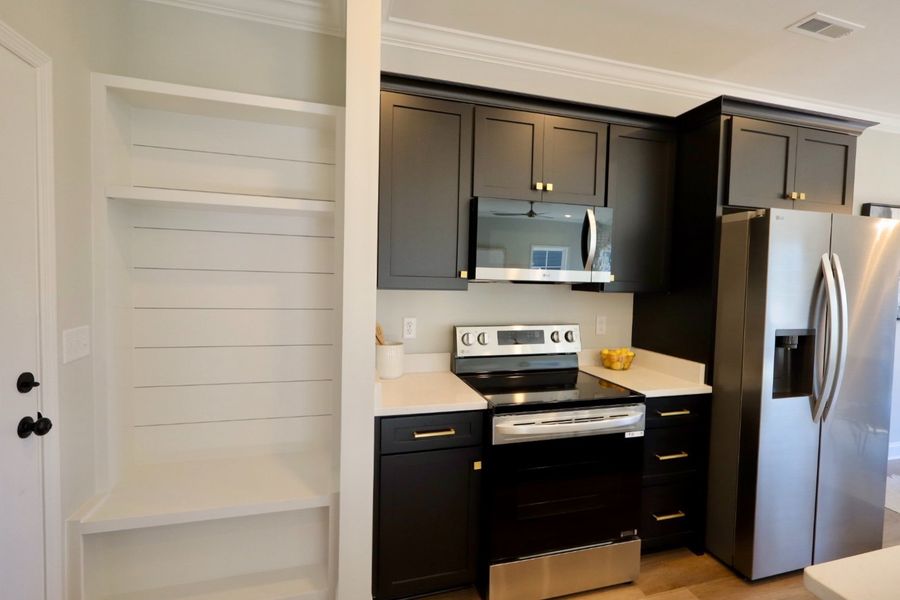 Furnished interior in a model home at The Eleuthera in Chattanooga (Image 37).