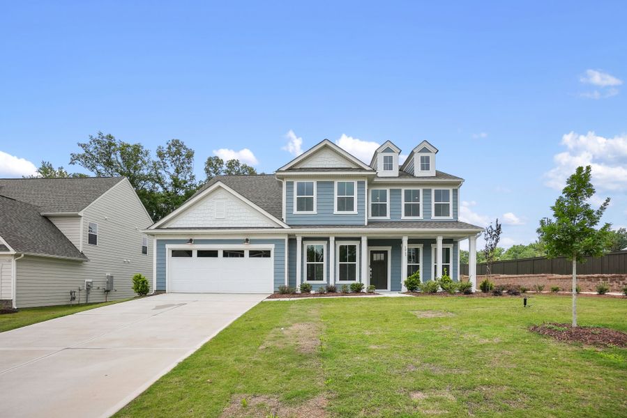 Front exterior of a new home in Kinsdale, Lancaster, SC, highlighting curb appeal (Image 35). Front exterior of a new home in Kinsdale, Lancaster, SC, highlighting curb appeal (Image 35).