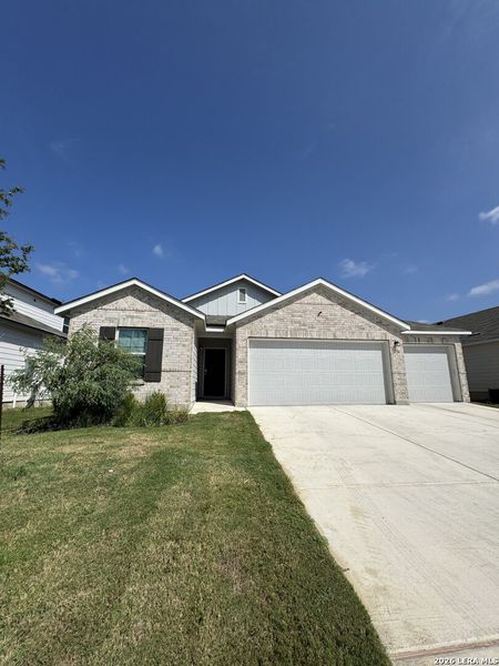 Front exterior of a new home in Greenspoint Heights, Seguin, TX, highlighting curb appeal (Image 1). Front exterior of a new home in Greenspoint Heights, Seguin, TX, highlighting curb appeal (Image 1).