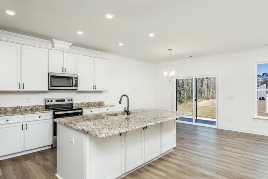 Furnished interior view inside a new home in Daniel Farms, Benson (Image 7).