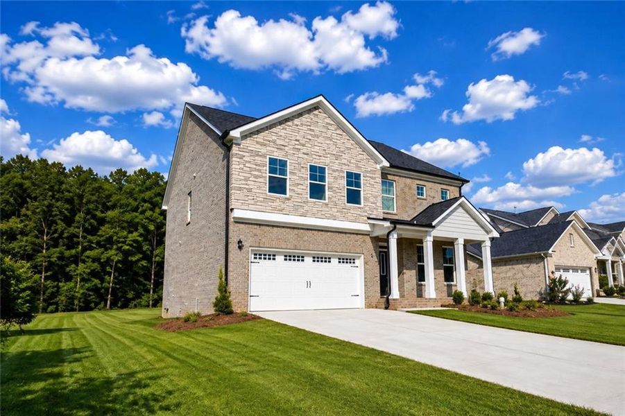 Front exterior of a new home in Westland, Bogart, GA, highlighting curb appeal (Image 17). Front exterior of a new home in Westland, Bogart, GA, highlighting curb appeal (Image 17).