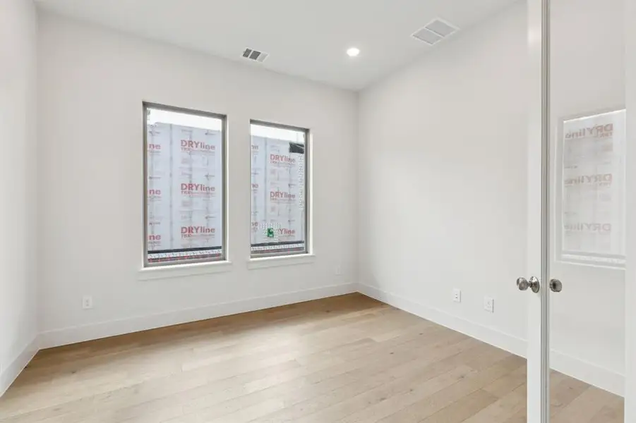 The professional working from home will appreciate this private, light filled home office.