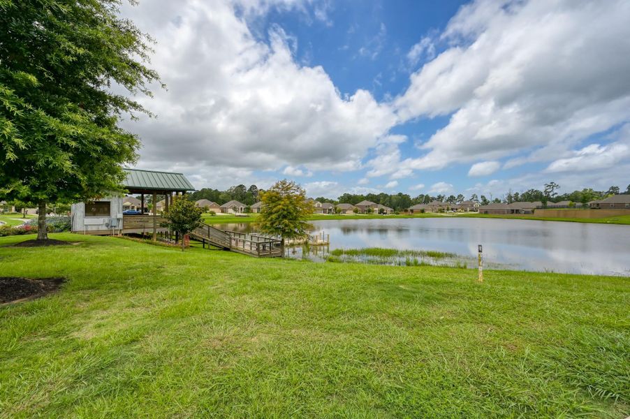 Scenic neighborhood lake offering peaceful water views, open green space, and a picturesque setting for walking, relaxing, fishing, and enjoying the natural beauty. Scenic neighborhood lake offering peaceful water views, open green space, and a picturesque setting for walking, relaxing, fishing, and enjoying the natural beauty.