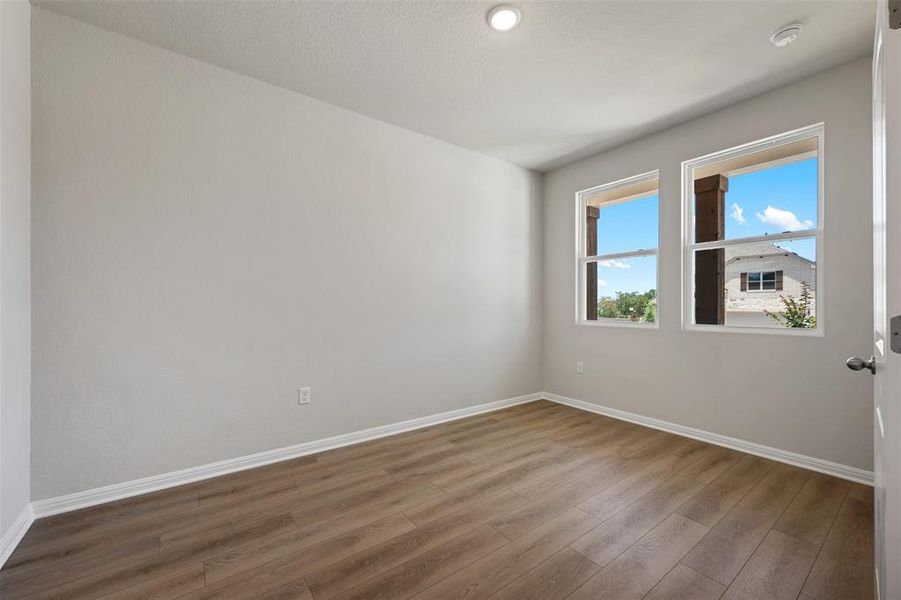 Spacious, unfurnished interior of a new home in The Colony, Bastrop (Image 18). Spacious, unfurnished interior of a new home in The Colony, Bastrop (Image 18).