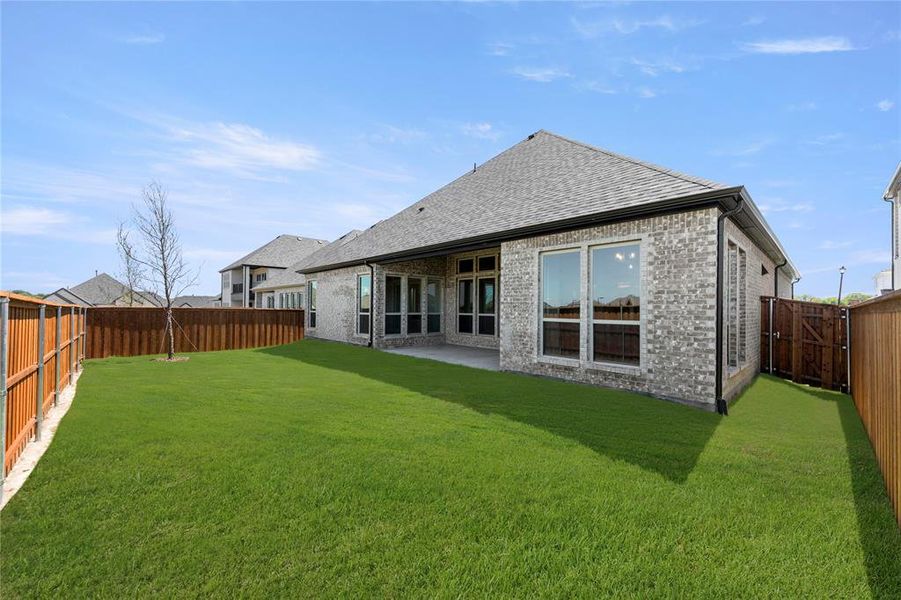 Front exterior of a new home in Nelson Lake Estates, Rockwall, TX, highlighting curb appeal (Image 19).