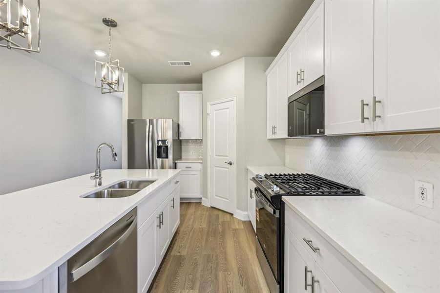 Photo is not of the actual home, but is an inspirational photo of builder’s model home and may depict options, furnishings, and/or decorator features that are not included.