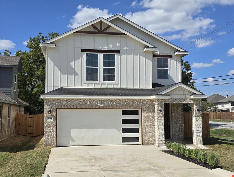 View of front of house with a garage