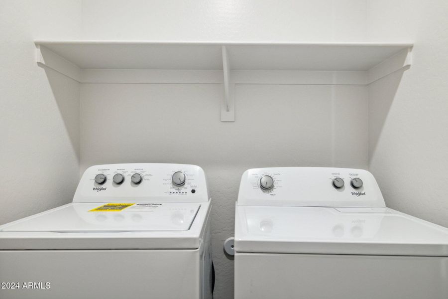 laundry with washer.dryer