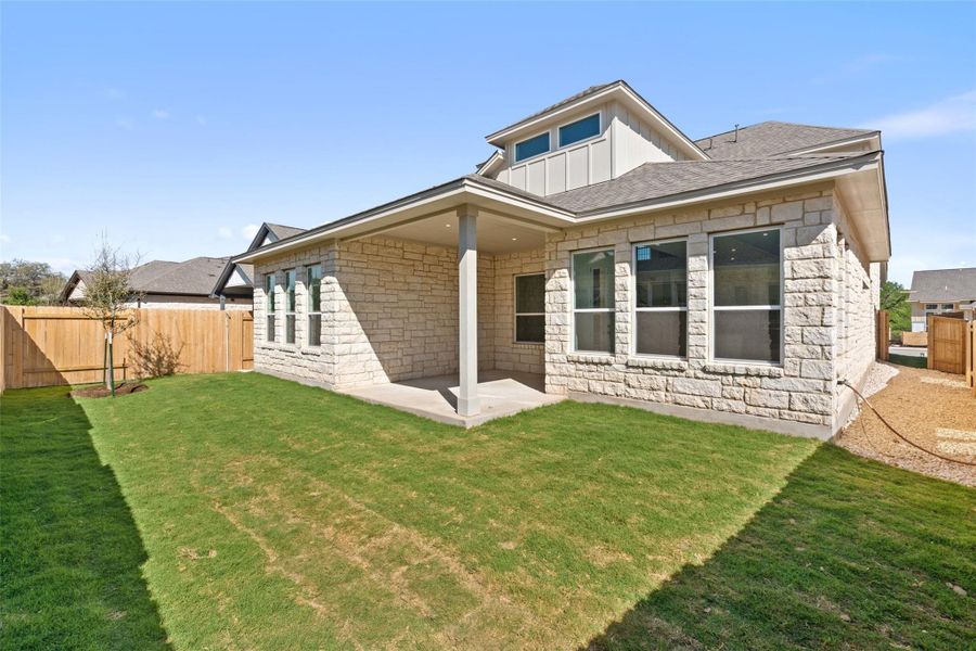 Exterior details and patio area of a home in Persimmon, Buda (Image 3).