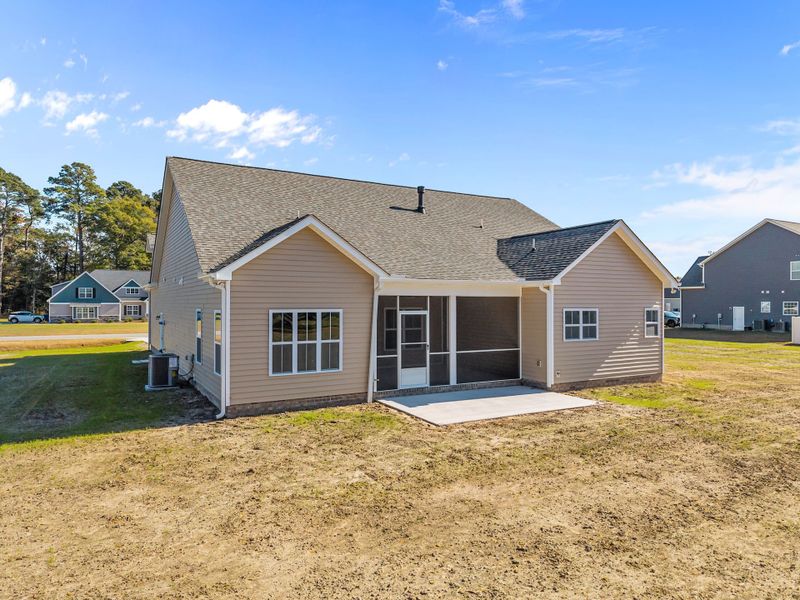 Exterior details and patio area of a home in Kennedy's Crossing, Grimesland (Image 25).