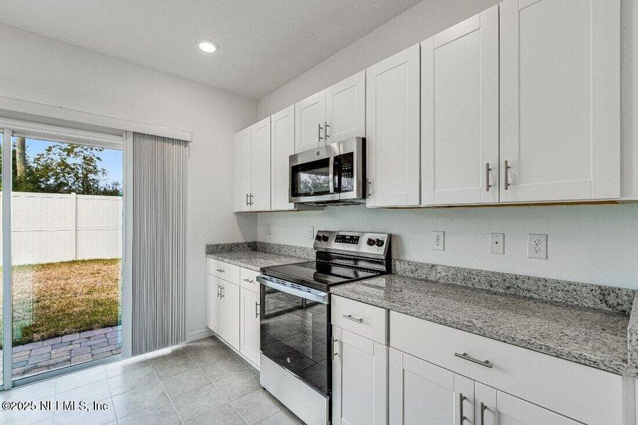 Furnished interior view inside a new home in Coopers Meadow, Jacksonville (Image 9).