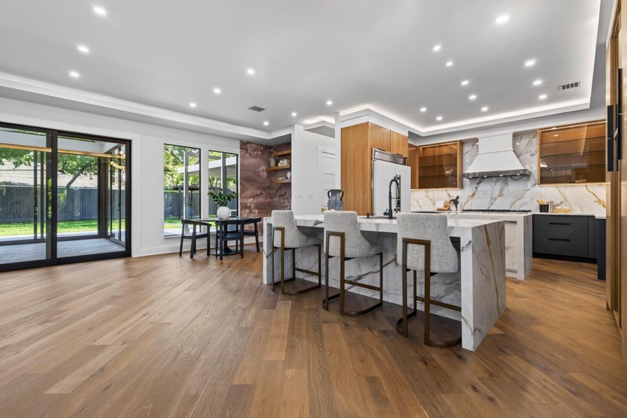 Open-concept kitchen and living spaces are thoughtfully designed for both everyday living and entertaining.