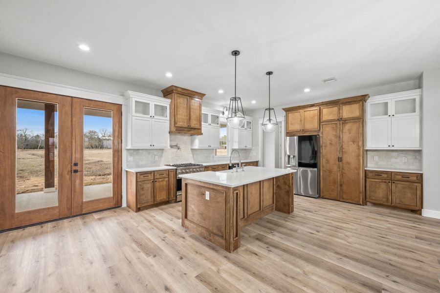 Furnished interior view inside a new home in , New Waverly (Image 33).