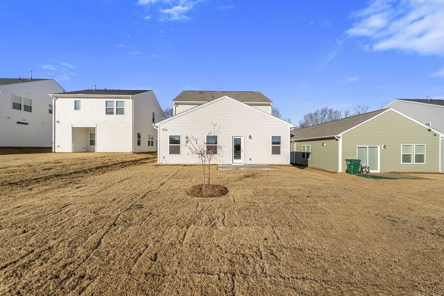 Exterior details and patio area of a home in Richmond Hill, Inman (Image 3).