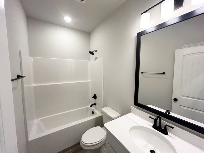 Furnished interior view inside a new home in The Bluffs at Lafayette, Freeport (Image 6).