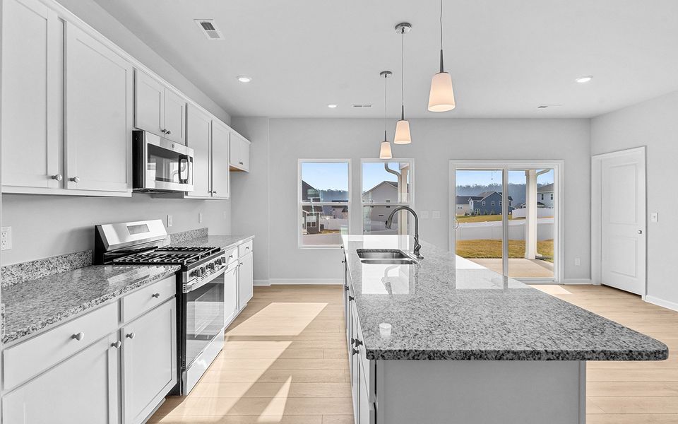 Furnished interior view inside a new home in Hanes Lake, Winston-Salem (Image 11). Furnished interior view inside a new home in Hanes Lake, Winston-Salem (Image 11).
