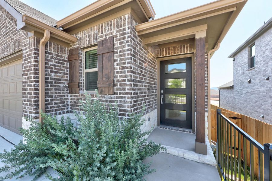 Exterior details and patio area of a home in Lakeside at Tessera, Lago Vista (Image 3).