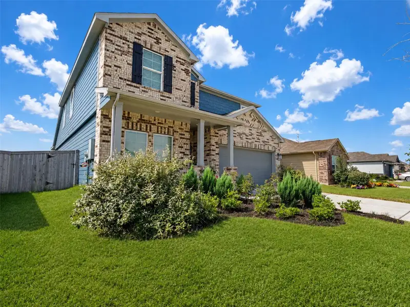 Front exterior of a new home in , La Marque, TX, highlighting curb appeal (Image 22).