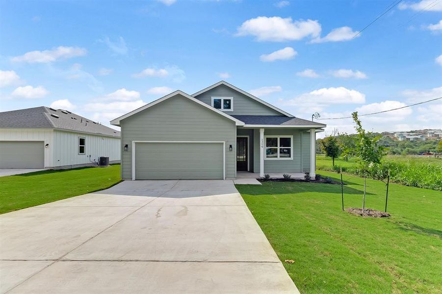 Front exterior of a new home in , Marble Falls, TX, highlighting curb appeal (Image 20).